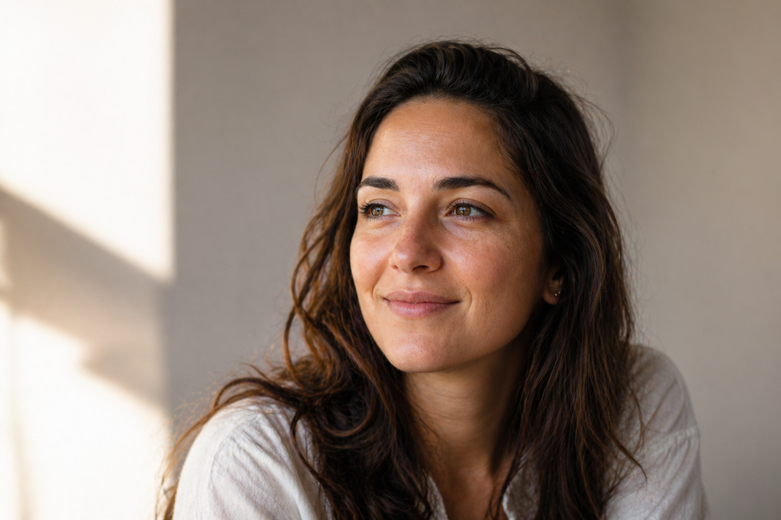 Person feeling hopeful in natural light